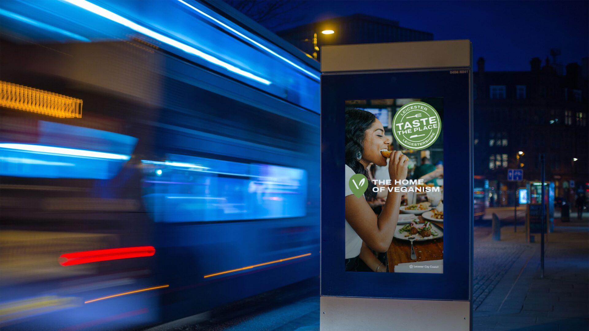 Taste the Place home of veganism poster outdoors