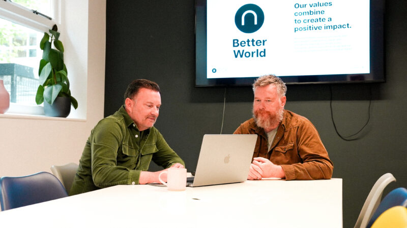 Co-founders and Directors, Joe Nixon and Luke Harrison, having a discussion in the meeting room